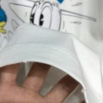 645302 Donald Duck print cotton linen T-shirt ivory