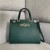 Gucci Zumi grainy leather medium top handle bag in Dark Green